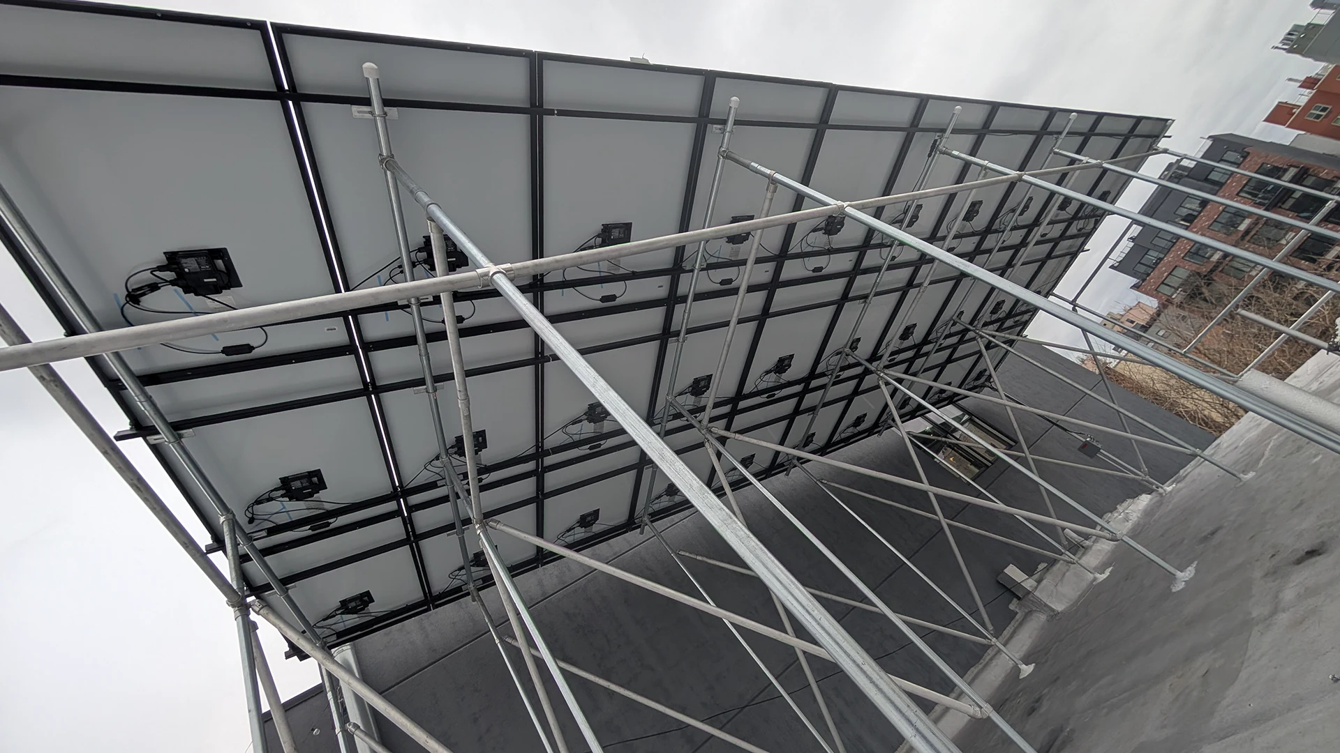 Building with canopy solar system installed in Bedstuy, Brooklyn, NY.